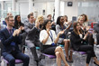 © Monkey Business - Audience Applauding Speaker After Conference Presentation