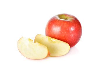 whole and slice apple on white background