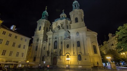 Canvas Print - The Church of St. Nicholas night timelapse hyperlapse in Prague, Czech Republic