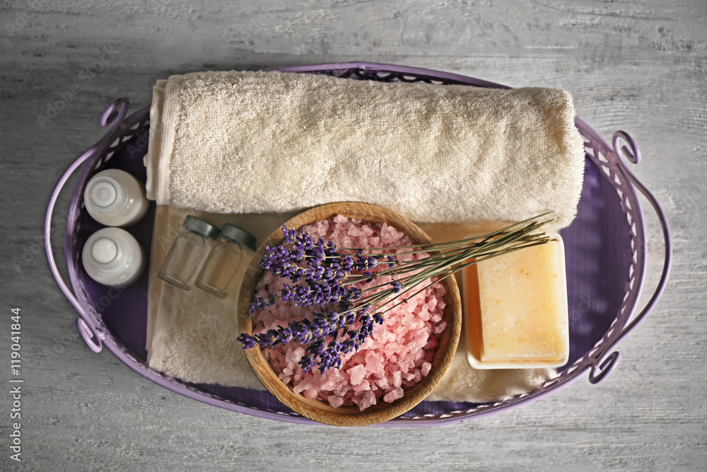 Beautiful spa composition with lavender on wooden table