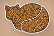 cat food in ceramic bowl on brown paper background
