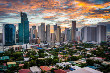 Wall Mural - View of the skyline of Makati at sunset, in Metro Manila, The Ph