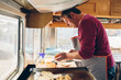 © ADDICTIVE STOCK - Adult man is cooking hamburger