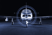 The Small Single-engine Piston Aircraft On The Runway, Illuminat