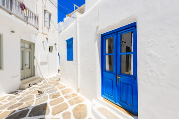 Naklejka na meble Blue door and windows of typical house on street of beautiful Mykonos town, Cyclades islands, Greece