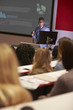 © Monkey Business - Lecture in a darkened university lecture theatre, vertical