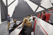 © Monkey Business - Man lectures students in lecture theatre, front row seat POV