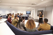 © Monkey Business - Female teacher addressing university students in a classroom