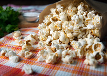 Salted Popcorn In A Paper Bag Close Up