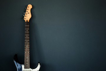 Electric guitar and the wall