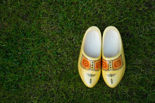 Traditional Dutch Wooden Shoe Clogs On Grass