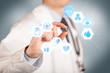 © ra2 studio - A doctor in white holding a pill