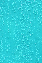 Close Up Water Drop On Blue Background.