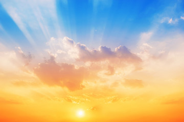 Wall Mural - Sunset sky background,The sky will change colors from blue to orange.