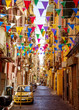 Narrow street in old town of Naples city in Italy