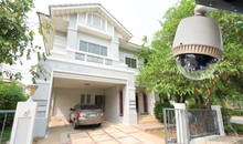 CCTV Camera Or Surveillance Operating In Front Of House