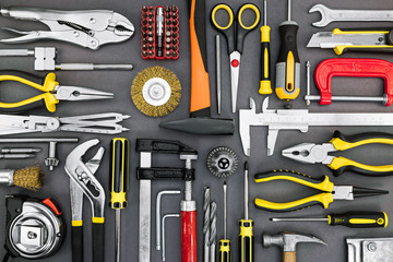 Poster - set of different hand tools on grey background