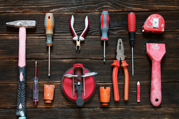 old working tools for repair, industrial alpenizmu in red