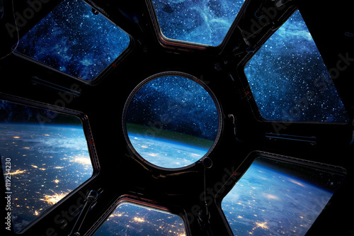 Tela Earth and star in spaceship window porthole