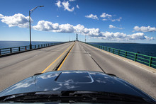 Driving Across The Mackinac Bridge In Michigan.  It Is The Largest Suspension Bridge In The Western Hemisphere. The Bridge Is Part Of Interstate 75.