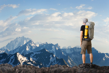 Wall Mural - man hiking in mountains