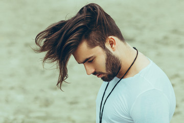 Wall Mural - Portrait of a man with beard and modern hairstyle