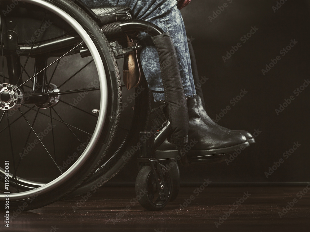 Legs of disabled person.
