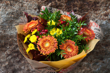 Wall Mural - Beautiful colorful bouquet on wall background