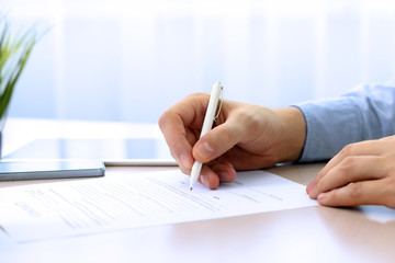 businessman is signing a contract, business contract details