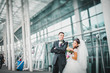 © nataliakabliuk - Romantic gentle gorgeous bride and groom on the background of modern futuristic architecture