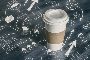 Wall Mural - Coffee cup with business drawings