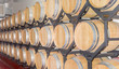 Wine in new oak barrels on a shelving