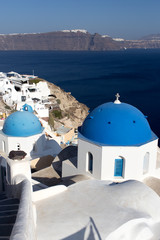 Wall Mural - Santorini Island - view of the white city and the blue sea