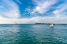 Two Sailboats In Channel