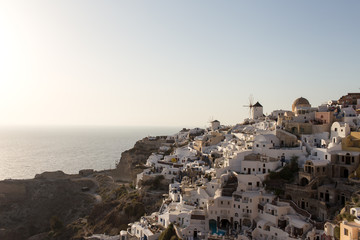 Wall Mural - Santorini Island  - view of the famous windmills at sunset