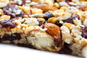 Poster - Detail of fruit, nut and seed bar with cranberries.