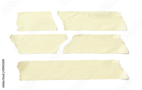 Fotomural collection of various adhesive tape pieces on white background