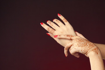 Woman Hands with mehndi