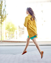 Canvas Print - young woman or teenage girl legs on city street