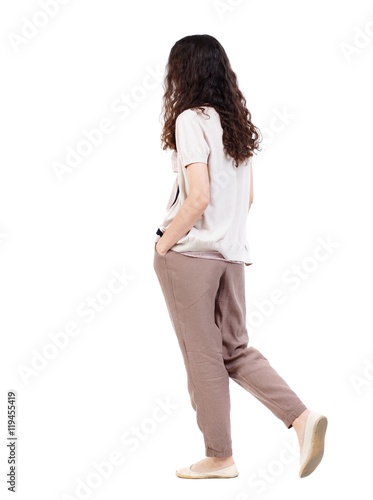 Back View Of Walking Curly Woman Backside View Of Person Long