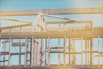 new house construction interior with exposed framing, photograph