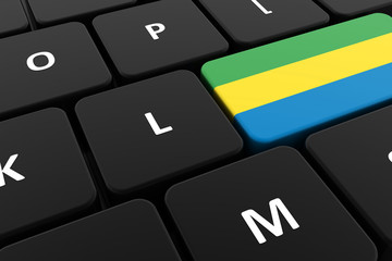 Computer keyboard, close-up button of the flag of Gabon. 3D render of a laptop keyboard