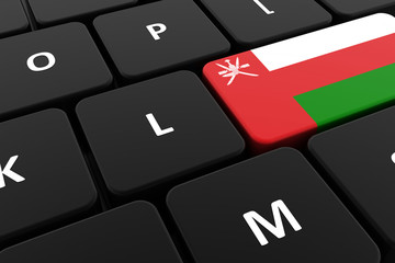 Computer keyboard, close-up button of the flag of Oman. 3D render of a laptop keyboard