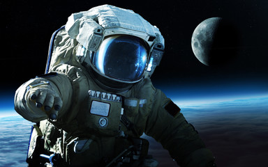 brave astronaut at the spacewalk on the moon. this image elements furnished by nasa