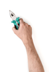 Wall Mural - Close-up view of a man's hand holding pliers isolated on white background