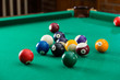 © smspsy - Billiard balls on green table with billiard cue, Snooker, Pool g