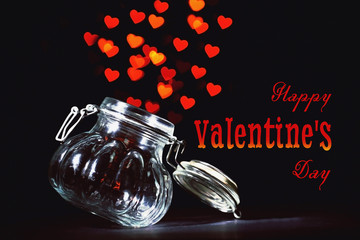 Wall Mural - Hearts flying out of glass jar. Blurred background. Text happy valentines day.