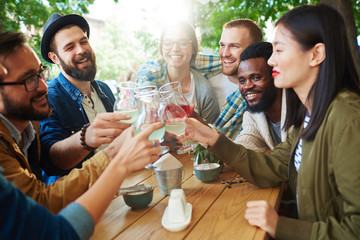 Wall Mural - Friends in outdoor cafe