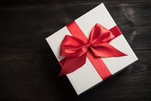 White Gift Box With Red Ribbon