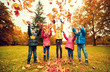 © Syda Productions - happy children playing with autumn leaves in park